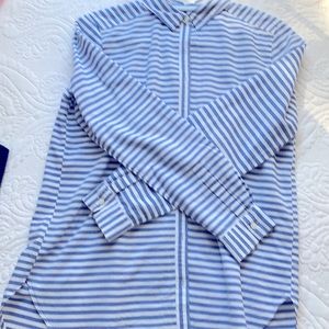 Long sleeved striped shirt.